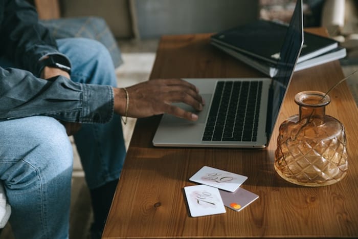 Man applying discount voucher on online shopping